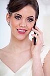 Beautiful Bride And Mobile Phone Stock Photo