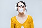 Beautiful Brunette Woman Listening To Music Stock Photo