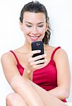 Beautiful Brunette Woman Looking The Mobile Stock Photo