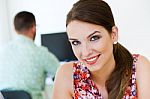 Beautiful Businesswoman Posing At Camera In Office Stock Photo