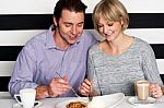 Beautiful Couple Having Morning Meal Together Stock Photo