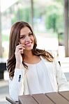 Beautiful Female Business Executive On Cell Phone Stock Photo