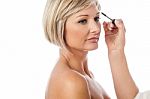 Beautiful Female Model Getting Makeup Done Stock Photo