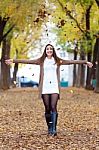 Beautiful Girl Having Fun In The Autumn Stock Photo