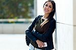 Beautiful Girl Looking At Camera In City Stock Photo