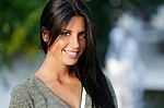 Beautiful Girl Posing At Camera In The Park Stock Photo