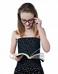 Beautiful Girl reading Book Stock Photo