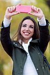 Beautiful Girl Taking A Selfie In Autumn Stock Photo