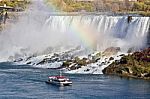 Beautiful Image With Amazing Niagara Waterfall, Rainbow, And A Ship Stock Photo