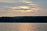 Beautiful Isolated Image With The Lake And The Forest On The Sunset Stock Photo