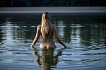 Beautiful Naked Woman Standing In Water Stock Photo