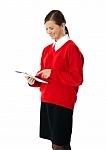 Beautiful Teenage Using Electronic Tablet Stock Photo