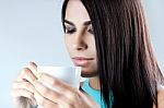 Beautiful Woman Drinking Coffee Stock Photo