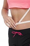 Beautiful Woman Is Measuring Her Waist Stock Photo