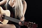 Beautiful Woman Playing Guitar Stock Photo