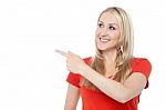 Beautiful Woman Pointing At Something Stock Photo