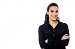 Beautiful Woman Posing With Arms Crossed Stock Photo