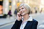 Beautiful Woman Talking On A Cell Phone Stock Photo