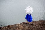 Beautiful Woman Wear Blue Evening Dress Hold White Umbrella Watc Stock Photo