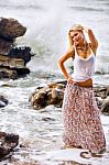 Beautiful Young Blonde Woman Posing Outdoor At The Rocky Sea Sho Stock Photo