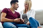 Beautiful Young Couple In Love At Home Stock Photo