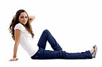 Beautiful Young Model Sitting On Ground Stock Photo