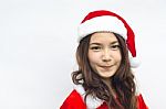 Beautiful Young Santa Clause Woman, Isolated Stock Photo