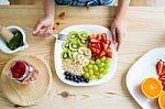 Beautiful Young Woman Enjoying Breakfast At Home Stock Photo