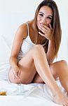 Beautiful Young Woman Having Breakfast On Bed Stock Photo