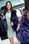 Beautiful Young Woman Shopping In A Clothes Shop Stock Photo