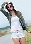 Beautiful Young Woman Walking In The Park Stock Photo