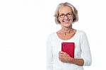 Bespectacled Lady Posing With Tablet Pc Stock Photo