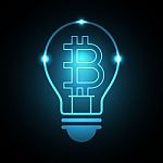 Bitcoin With Light Bulb Stock Photo