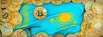 Bitcoins Gold Around Kazakhstan  Flag And Pickaxe On The Left.3d Stock Photo