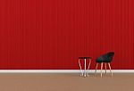 Black Chair In A Red Room Stock Photo