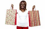 Black Girl Holding Shopping Bag Stock Photo