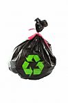 Black Plastic Garbage Bag And Recycle Sign On White Background Stock Photo