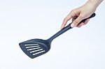 Black Plastic Kitchen Spatula On White Background Stock Photo