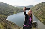 Blond Woman Taking A Selfie Stock Photo