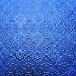 Blue Color Glass With Thai Pattern Style Stock Photo