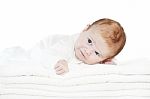 Blue Eyes Baby Boy On White Towels Stock Photo