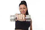 Body Of Slim Female In Activewear Doing Exercise With Dumbbells Stock Photo