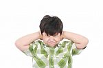 Boy Closing His Eyes And Ears Stock Photo