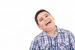 Boy Laughing On White Background Stock Photo