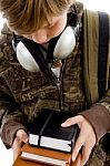 Boy Looking Books With Headphone Stock Photo