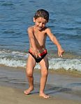 Boy On The Beach Stock Photo