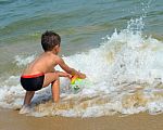 Boy On The Beach Stock Photo