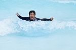 Boy Play In Clear Water Stock Photo