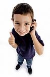 Boy Talking Phone With Thumb Up Stock Photo