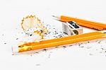 Broken Pencil With Metal Sharpener And Shavings Stock Photo